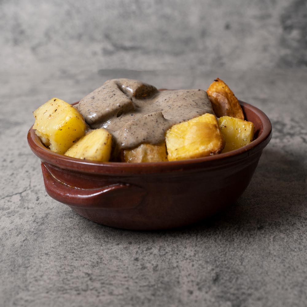 Patate al forno con crema di formaggio al profumo di tartufo