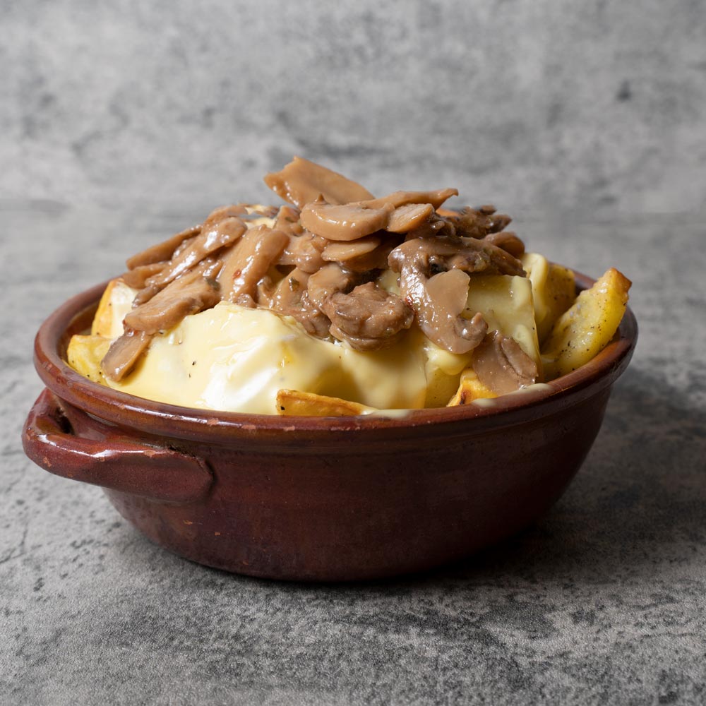 Patate al forno con funghi Champignon e crema di formaggio